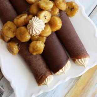 Gluten-free Chocolate Crepes w/ caramelized bananas and peanut butter drizzle